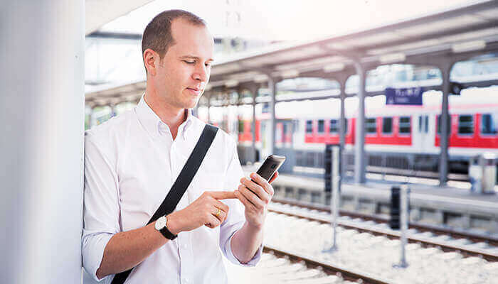 mobile on train platform