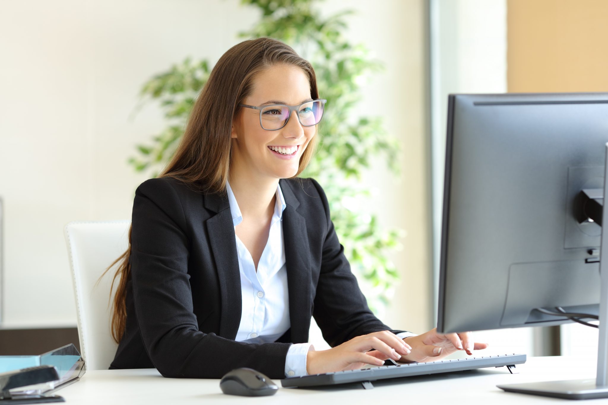 smiling woman providing customer service with TeamViewer customer relations...